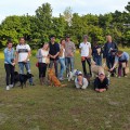 Another bunch of proud dog owners graduate in the obedience class